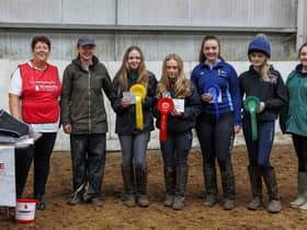 Margretta Chambers from Air Ambulance NI presenting the prizes to the winners in the 75cms class.  Also in the photo is Ruth Baird from the Gamekeepers Lodge & Lily Rose McGinn from Hugh McGinn Haulage.