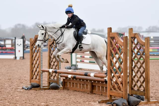Abbie Harkness riding Melody, clear in the 70cm