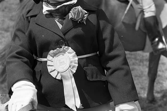 Pictured in late July 1980 celebrating her second birthday is Heather Clingham from Dromara. She made her debut with her pony Pedro at the Castewellan Show, when Pedro was placed fifth. They had to brave atrocious weather, noted the News Letter, but the “devoted faithful” stuck out the downpours and were rewarded warm sunshine in the later afternoon. Picture: News Letter archives/Darryl Armitage