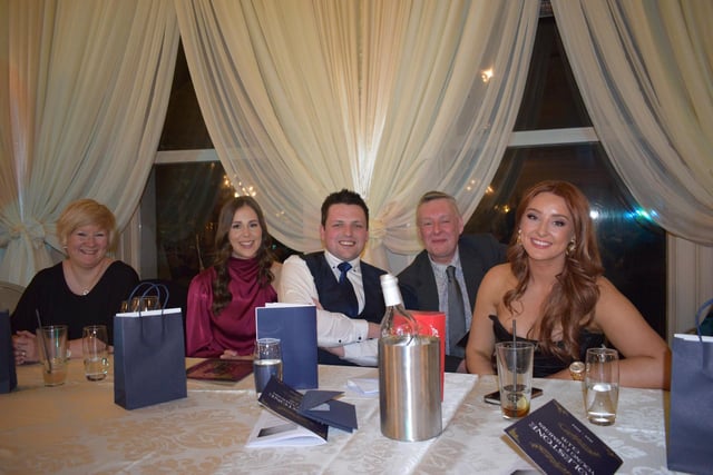 Some of the top table having a catch up after dinner at the Holestone YFC 80th anniversary dinner at the Galgorm Resort. Picture: Holestone YFC