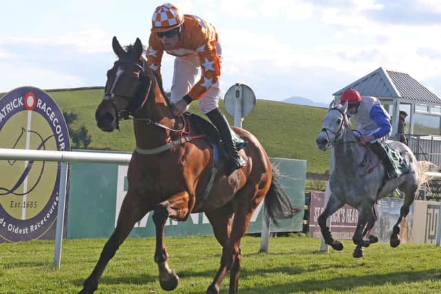 Custers Mistake partnered by top local amateur rider Dara McGill supplies rookie trainer and farrier Ross Tumilty with his first winner on the course proper. (Pic: Freelance)