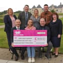 Celebrating the collective efforts of Lough Erne Resort and Cash For Kids NI that, so far, has resulted in £38,532 being raised to combat holiday hunger amongst children are (back row from left): Rachel Prothero, Gareth Byrne, Clare McGimpsey and Nathan Carter. Front row: Jonathan Gallagher, Lexi McKechnie, Barry McCauley and Marion Little.