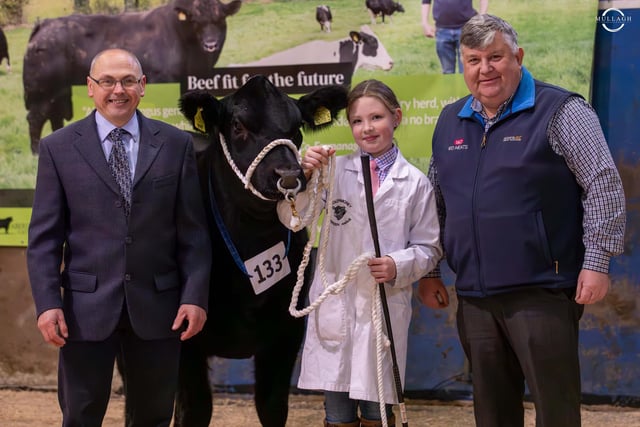 Jasmine Parke was the winner of the junior handling class. She was congratulated by judge Brian Clarke, Ayrshire; and sponsor Alan Shaw, WD Meats. Picture: David Porter, Mullagh Photography
