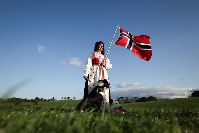 Linn Kristin Flaten from Norway with some of her team’s competition dogs. (Photo by Kelvin Boyes / Press Eye)