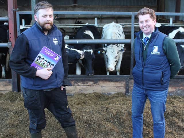 Ai Services' Gary Henderson (right) congratulating Co Londonderry dairy farmer Scott Thompson on winning the opportunity to take part in a study trip to Denmark later this year