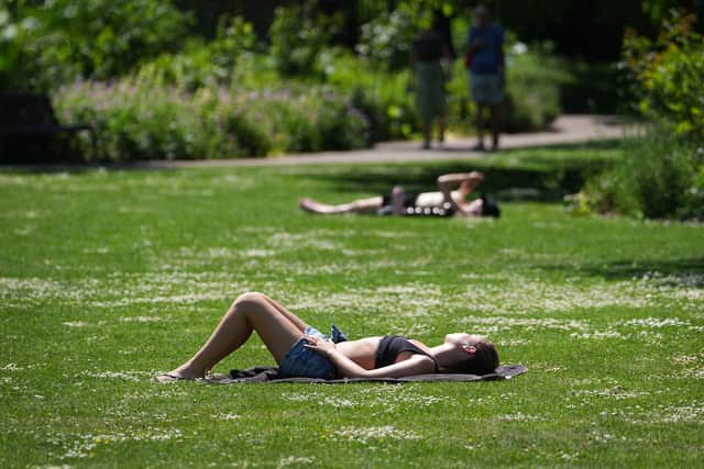 The record for the hottest May day has been broken again, with provisional temperatures reaching 35C, the Met Office has said.
