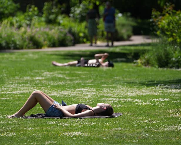 The record for the hottest May day has been broken again, with provisional temperatures reaching 35C, the Met Office has said.