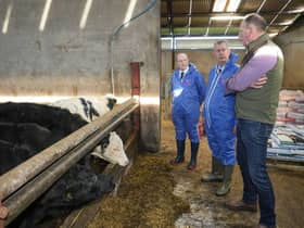 Minister Poots is pictured with (left to right) Dr Sam Strain, Chief Executive of AHWNI and farmer Mr Brian Cromie.