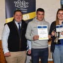 Winners of the dairy stock judging 18-21 age category with YFCU president, Stuart Mills (left) and Ryan Godfrey from Fane Valley Group (right). Picture: YFCU
