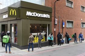 Delivery riders queue up outside a McDonald's restaurant in east London after the restaurant opened for delivery only orders (Photo: DANIEL LEAL-OLIVAS/AFP via Getty Images)