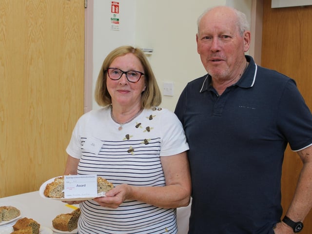 Geoffrey Davidson and his wife Helen with her prize winning Wheaten
