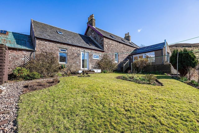 The traditional farmhouse has well-presented accommodation including kitchen, dining room, living room, bathroom, conservatory, three bedrooms and family shower room. The garden lies to the rear of the property and is mostly laid to lawn with a number of shrubs and trees.