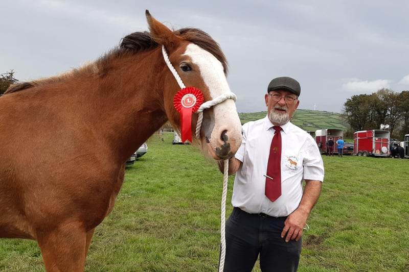 John Cross, chairman of the Mounthill Fair, from Ballynure, with Castletown Clover, a one year old filly who was awarded first prize at the fair. Picture: Darryl Armitage