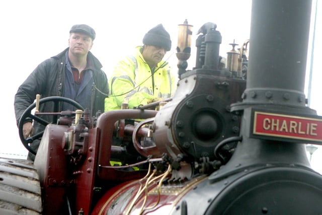 Men at work on steam engine day. Picture: Kevin McAuley