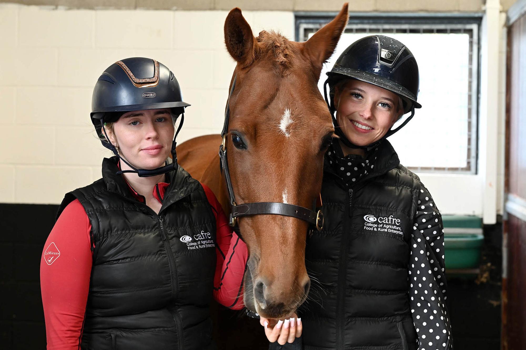 CAFRE students Sienna McPhillips (Cavan) and Emily Smyth (Armagh) introduced visitors at the Equine Open Day to campus horse Tim.