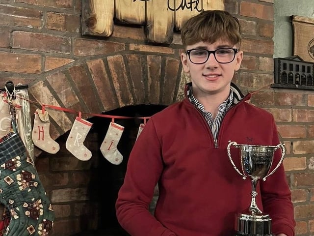 James Rankin with his award at Donaghadee YFC's recent annual Christmas awards dinner at Saints N’ Sinners in the seaside town.