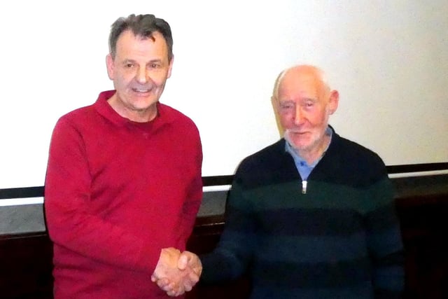 David Wilkinson hands over a cheque to Raymond Murray, Turning Point. Picture: Alan Hall