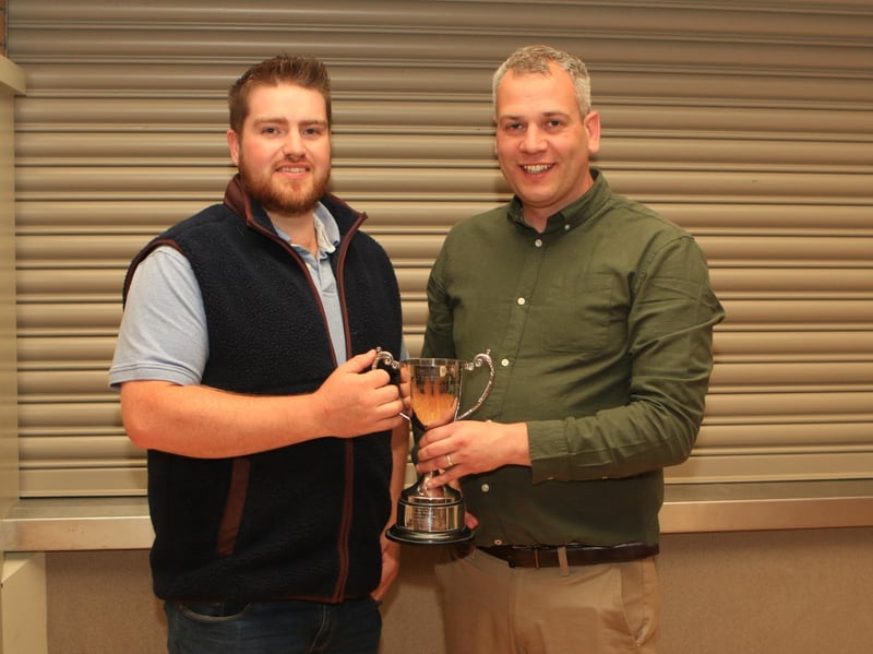 Martin Cunningham, presented by chairman Shane McDonald, the Open Class winner's cup at this year’s stock judging.
