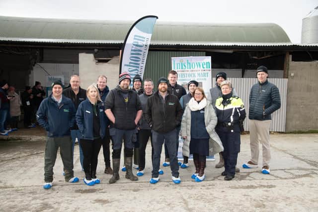 Paul Scott with exhibitors at the Inishowen Co-Op Dairy Health and Calf Rearing Information event on the farm of Paul Scott, Carndonagh on Thursday last.