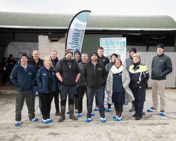 Paul Scott with exhibitors at the Inishowen Co-Op Dairy Health and Calf Rearing Information event on the farm of Paul Scott, Carndonagh on Thursday last.
