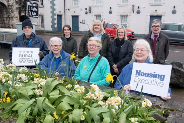 Carnlough Community Group volunteers who clinched the Community Spirit, north region, title in the Housing Executive’s prestigious annual rural awards.