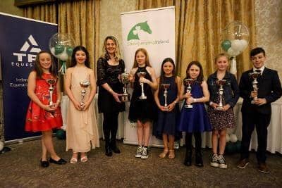 Bree Rutledge presented the Balmoral Under 10s winner Chloe Clarke and all qualified participants with their awards. (Pic: SJI Ulster Region)