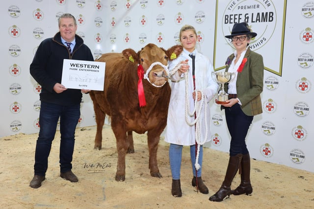 The Champion Cattle Young Handler (13 -16 years old sponsored by Western Farm Enterprises and the recipient of the Stanley Reid Cup at the 2022 Royal Ulster Premier Beef & Lamb Championships was exhibited by Amy Vance from Whitmore, Dumfries and Galloway.  Pictured (L-R) Stewart Baxter (Western Farm Enterprises), Amy Vance and Gail Matchett (Judge).