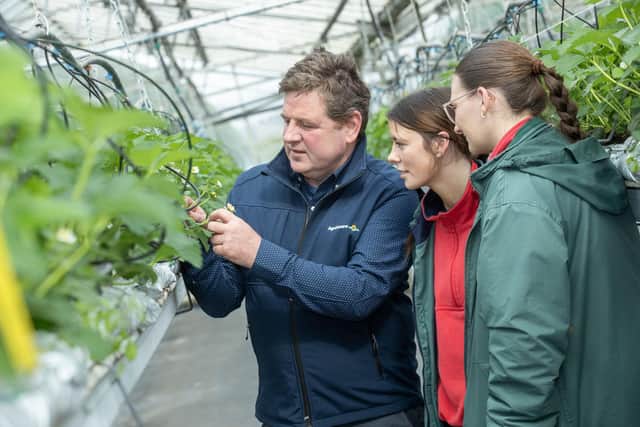 Chairman of Agri Aware Shay Galvin speaking with 6th year pupils Bronagh Nolan and Niamh Graham from St Leo's Secondary School, Co Carlow, at the Agri Aware farm walk and talk event at Kildalton Agricultural College. Picture: Submitted