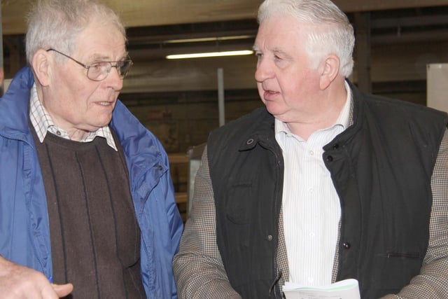 Simmental breeders Billy Robson OBE, Doagh, and Cecil McIlwaine, Newtownstewart, at the club's Dungannon show and sale. Picture: Julie Hazelton