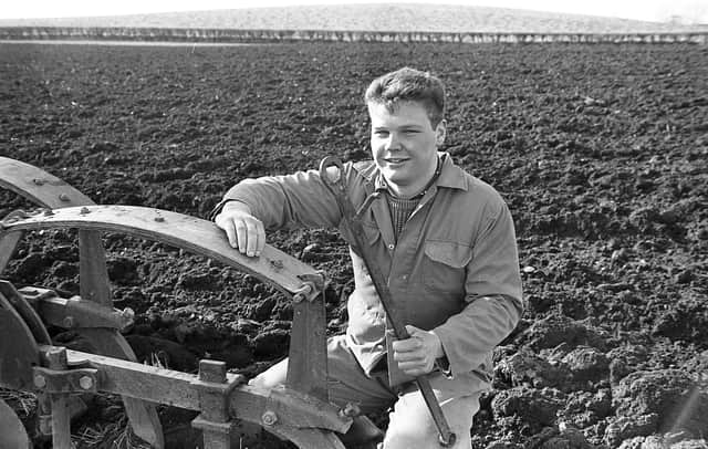 Geoffrey Turner, club leader of Donaghadee Young Farmers’ Club, pictured in February 1992, making adjustments before the 20-acre-plough-in to raise funds for the town’s Choice Residential Trust. Picture: News Letter archives