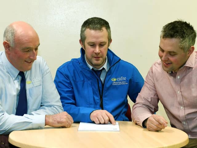 Robin Bolton and Leigh McClean CAFRE discussing the final 2024 NRoSo sprayer operators roadshow with Chris Gill, UFU.
