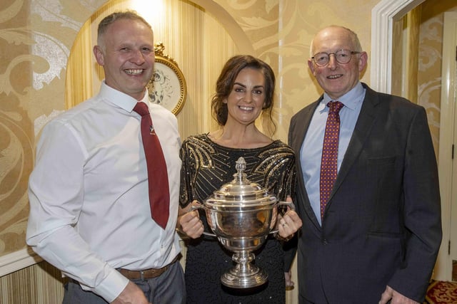 Martin Millar and Hannah Douglas Steele received the Holstein Friesian Perpetual Trophy for the supreme champion at Balmoral Show. Included is Holstein UK president Michael Smale who presented the awards. Picture: Kevin McAuley/McAuley Multimedia