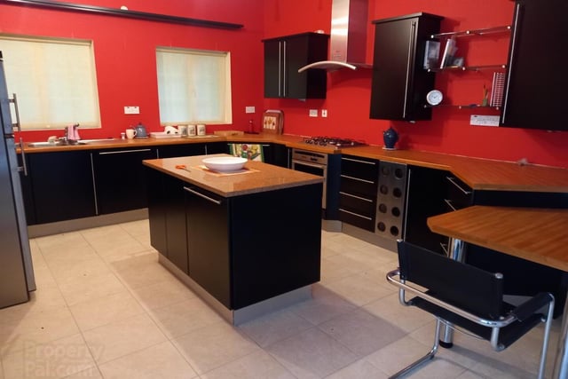 Full modern fitted kitchen with high and low level fitted units