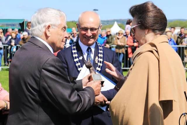 Mr Terence McKeag cracking a joke with Princess Anne. (Pic supplied by Stephen Dunne MLA)