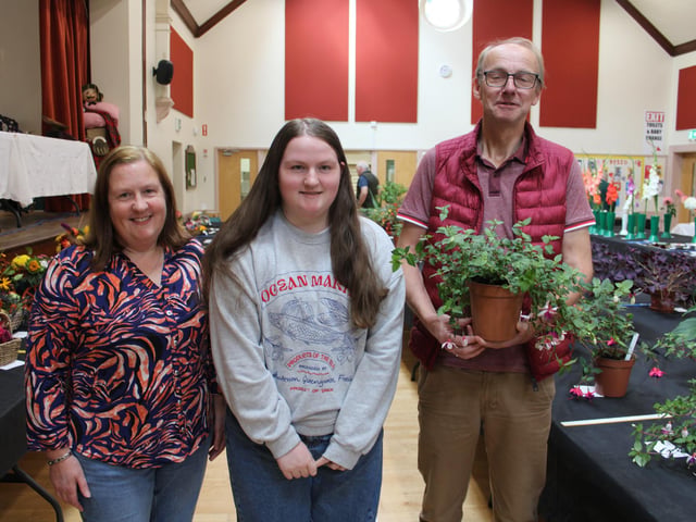 Mr and Mrs Brian Moorhead and Rebekah with their winning Fuchsia