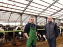 Dairy farmer George Bingham talks with Chris Chambers of Brett Martin about the positive impact of the new roofing on his herd. They are pictured on the Bingham dairy farm in county Antrim