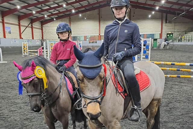 Prize winners of the 70cm class, sisters, Sophie Johnston on Ben (first) and Ella-Jane Johnston who rode Archie and Speedy to come second and third. (Pic: Ecclesville)