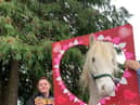 A service user enjoys some Valentine's fun at Laurel View.