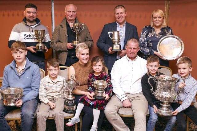Dairy winners at Fermanagh County Show are back from left, Conall Daly, Seamus Gunn with Stewart and Nyree Baxter. Front from left, Daniel Willis, Jamie, Leanne, Arianna, Alan, Dylan and Cody Paul.
