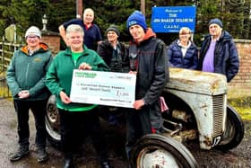 Chairman Myles Williams hands over the cheque to Jill from Macmillan Cancer Support. Also members present are Wilbert Robinson (treasurer), Paul Sempey, David Lyle, Avril Hume and Tony Magill (secretary).