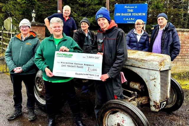 Chairman Myles Williams hands over the cheque to Jill from Macmillan Cancer Support. Also members present are Wilbert Robinson (treasurer), Paul Sempey, David Lyle, Avril Hume and Tony Magill (secretary).