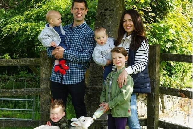Kelvin with his wife Liz and their children. (Image: Instagram/fletchersonthefarm)