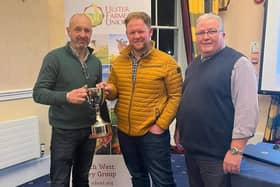 Allen Connell of Allen Connell Machinery sponsor of new Bale Silage cup presenting cup to group winner David Hylands and being congratulated by Group Chairman Robert Carmichael. (Pic: UFU)