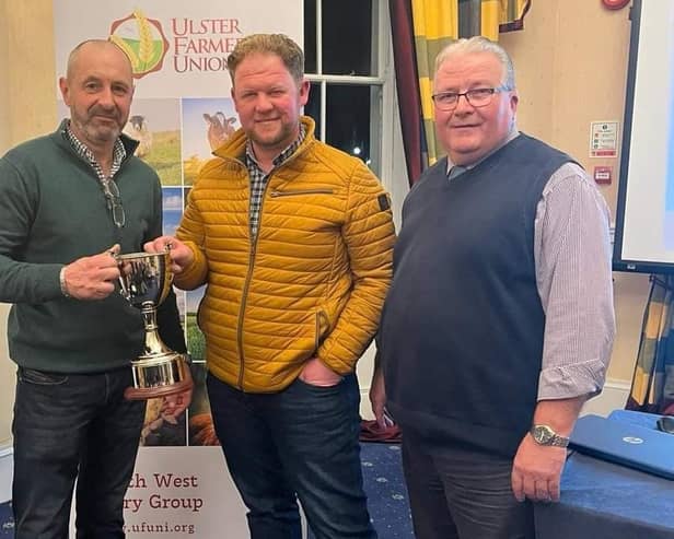 Allen Connell of Allen Connell Machinery sponsor of new Bale Silage cup presenting cup to group winner David Hylands and being congratulated by Group Chairman Robert Carmichael. (Pic: UFU)