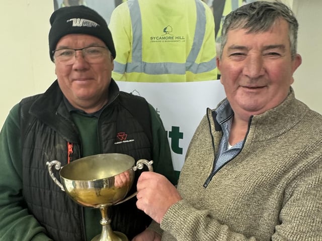 Nigel Gamble wins the Classic Class at Listooder Ploughing Match, prize presented by host Mr James Baird