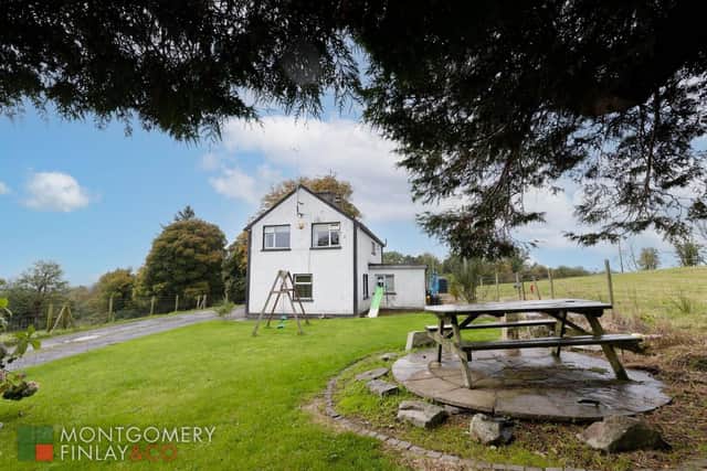 A three-bedroom farmhouse with a selection of agricultural outbuildings is for sale in Northern Ireland for offers around £250,000. Image: Montgomery Finlay and Co