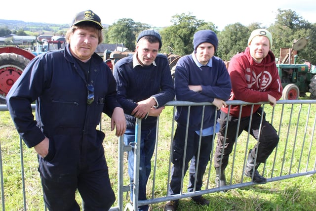 Watching the threshing at Scarva last Saturday, from Left, Mark Gibney, Jason and Nigel Magill and Aaron Ringland.