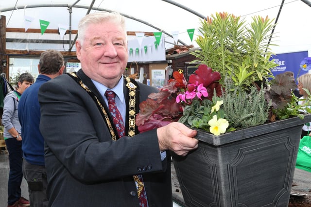 Mayor of Causeway Coast and Glens, Councillor Steven Callaghan shows of the planter he made at the ‘Feel-Good Gardening’ project. Cllr Callaghan has donated this to the Christmas Macmillan fundraising sale. Pic: McAuley Multimedia