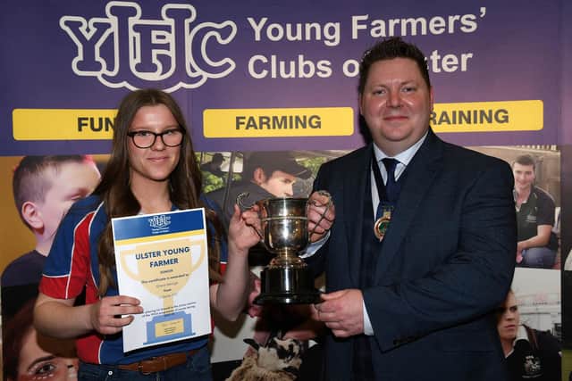Junior Ulster Young Farmer competition winner Grace George with YFCU president, Stuart Mills