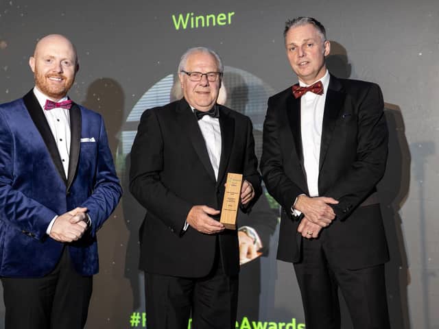 Former CEO of the NI Dairy Council, Dr Mike Johnston MBE was the recipient of the 'Lifetime Achievement' award at this week's Farming Life awards in association with Cranswick Country Foods. He is pictured with compere Barra Best and Martin Walsh, site financial controller, Cranswick. Pic: McAuley Multimedia